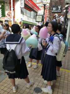 School girls eating Candy Floss