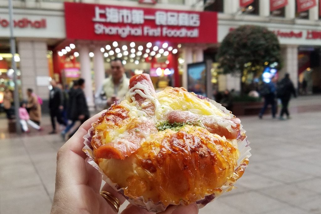 A snack outside the food market